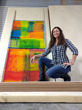 Artist Wendi La Fey with painting, "Fire Dance"