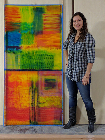 Artist Wendi La Fey with painting, "Fire Dance"